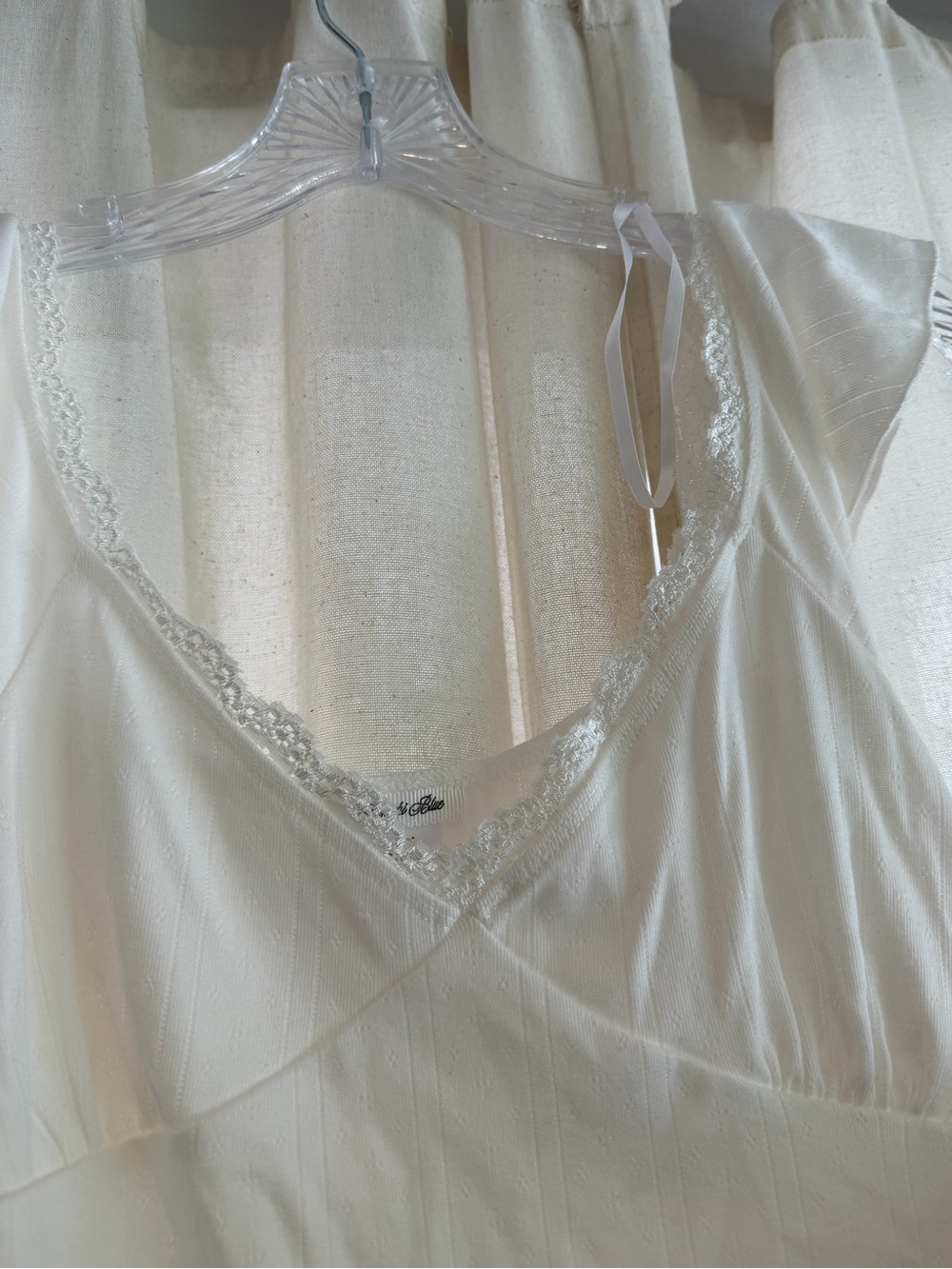 UO Kimchi Blue Posie Pointelle Knit Lace-Trim Ruffle Top in Ivory - Picture 9 of 9